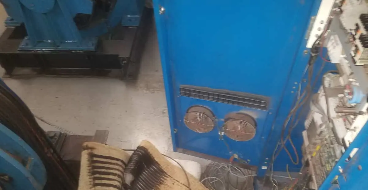 Elevator machine room with controller cabinet and resistor banks